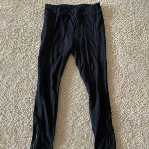 Fabletics black leggings with zip up on legs